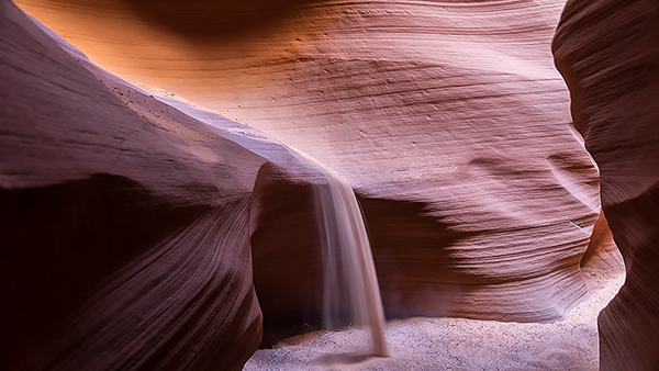Sand fall in a slot canyon